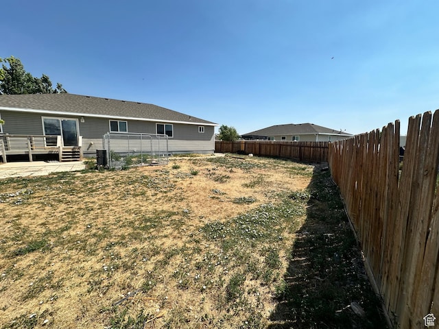 1373 W 925 S, Vernal, UT 84078 - fenced backyard featuring a wooden deck