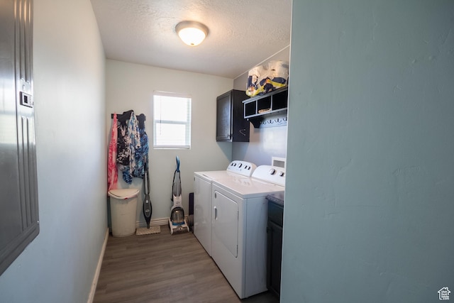 1373 W 925 S, Vernal, UT 84078 - washroom featuring baseboards, separate washer and dryer, cabinet space, a textured ceiling, and dark wood-style flooring