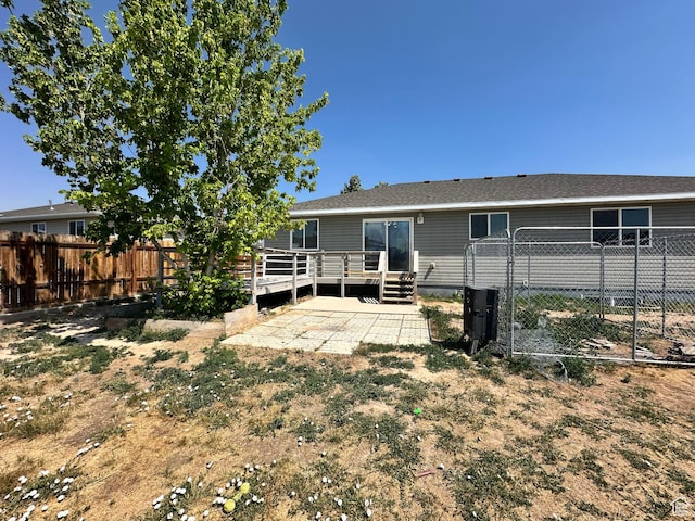 1373 W 925 S, Vernal, UT 84078 - rear view of property featuring a deck and a patio