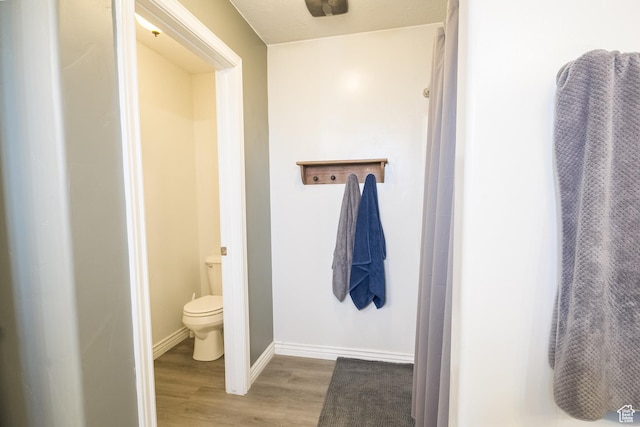 1373 W 925 S, Vernal, UT 84078 - bathroom featuring baseboards, wood finished floors, and toilet