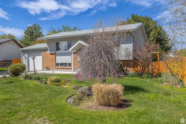 3788 W Hillsboro Cir, West Jordan, UT 84084 - split foyer home featuring fence, a front lawn, and brick siding