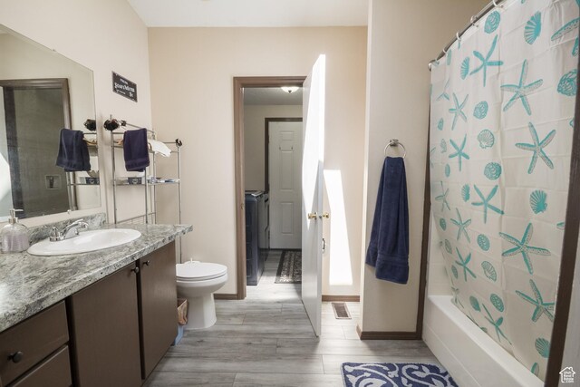 2036 W 1500 N, Vernal, UT 84078 - full bathroom featuring wood finished floors, vanity, baseboards, toilet, and visible vents