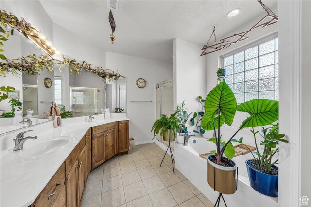 240 W 225 S, Ivins, UT 84738 - bathroom with a stall shower, double vanity, a bath, and healthy amount of natural light