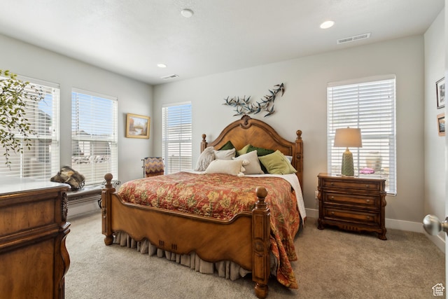 bedroom with recessed lighting, visible vents, carpet flooring, and baseboards