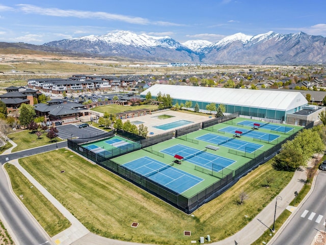 drone / aerial view featuring a mountain view