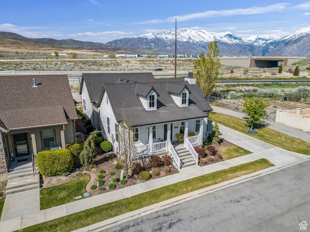 exterior space featuring a mountain view