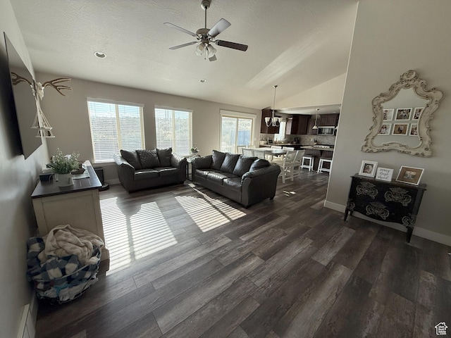 9104 N Cornwall Way E, Eagle Mountain, UT 84005 - living area featuring ceiling fan, dark wood-type flooring, baseboards, vaulted ceiling, and recessed lighting