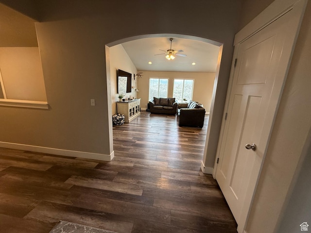 9104 N Cornwall Way E, Eagle Mountain, UT 84005 - corridor featuring arched walkways, dark wood-style flooring, baseboards, and recessed lighting