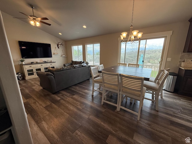 9104 N Cornwall Way E, Eagle Mountain, UT 84005 - dining space featuring vaulted ceiling, dark wood finished floors, recessed lighting, ceiling fan, and a chandelier