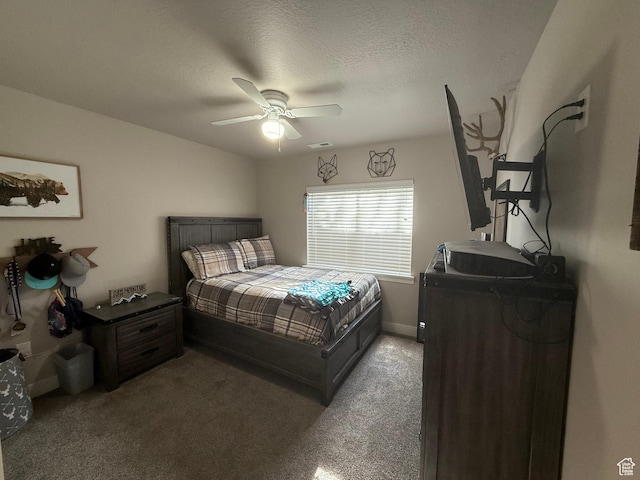 9104 N Cornwall Way E, Eagle Mountain, UT 84005 - bedroom with light colored carpet, ceiling fan, a textured ceiling, and baseboards