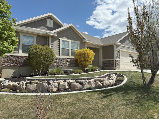 9104 N Cornwall Way E, Eagle Mountain, UT 84005 - view of front facade featuring stone siding, a garage, and a front yard