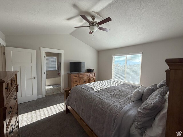 9104 N Cornwall Way E, Eagle Mountain, UT 84005 - bedroom featuring vaulted ceiling, carpet, a textured ceiling, a ceiling fan, and connected bathroom