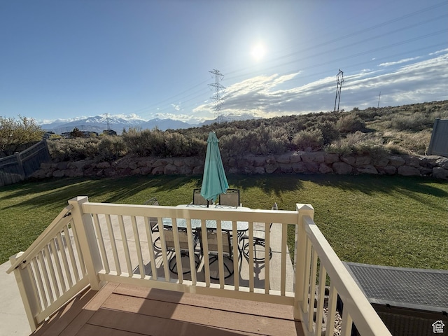 9104 N Cornwall Way E, Eagle Mountain, UT 84005 - deck featuring a mountain view and a yard