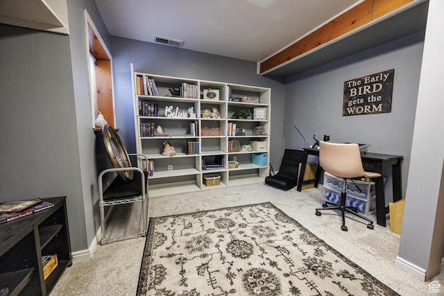 home office with baseboards, visible vents, and carpet flooring