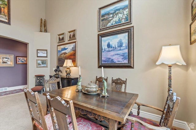 6109 S Vine Bend Ln, Murray, UT 84121 - dining space with baseboards, carpet flooring, and visible vents