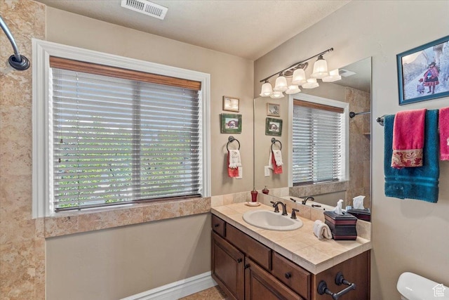 6109 S Vine Bend Ln, Murray, UT 84121 - bathroom with visible vents, toilet, and vanity