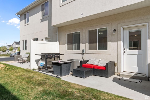 2636 S 2250 W Unit 124, West Haven, UT 84401 - exterior space with central air condition unit, a patio, and stucco siding