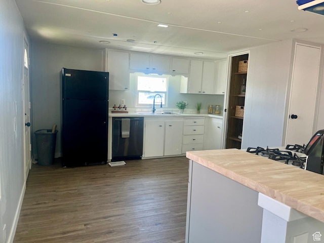 85 E 100 N, Redmond, UT 84652 - kitchen with a sink, dishwashing machine, white cabinetry, dark wood-style floors, and freestanding refrigerator
