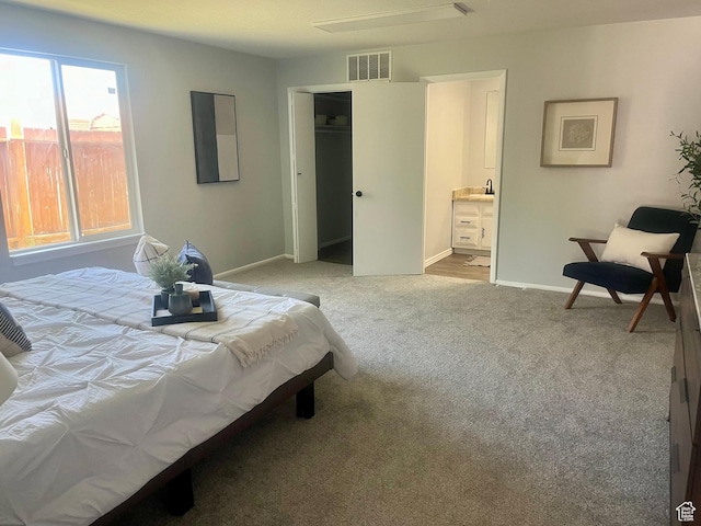 85 E 100 N, Redmond, UT 84652 - carpeted bedroom with visible vents, baseboards, and ensuite bathroom
