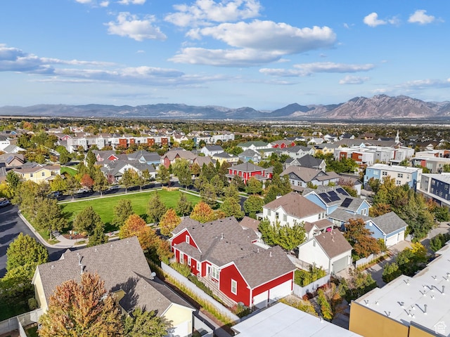 drone / aerial view with a residential view and a mountain view