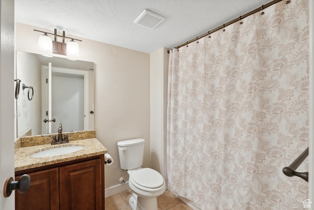 full bathroom featuring a textured ceiling, vanity, toilet, tile patterned flooring, and visible vents