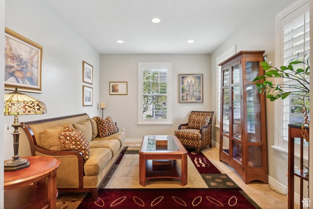 sitting room featuring baseboards and recessed lighting