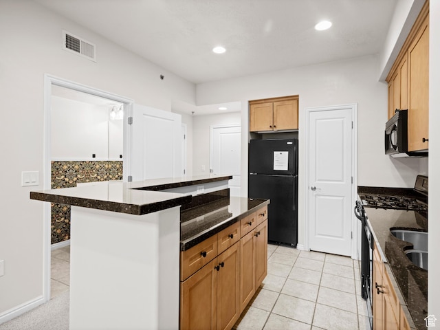 5 S 500 W Unit 311, Salt Lake City, UT 84101 - kitchen featuring dark stone countertops, visible vents, recessed lighting, black appliances, and light tile patterned floors