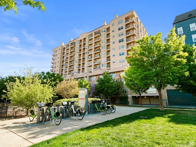 view of home's community with a lawn