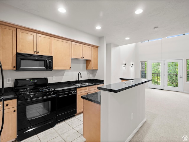 5 S 500 W Unit 311, Salt Lake City, UT 84101 - kitchen featuring dark countertops, a sink, recessed lighting, and black appliances