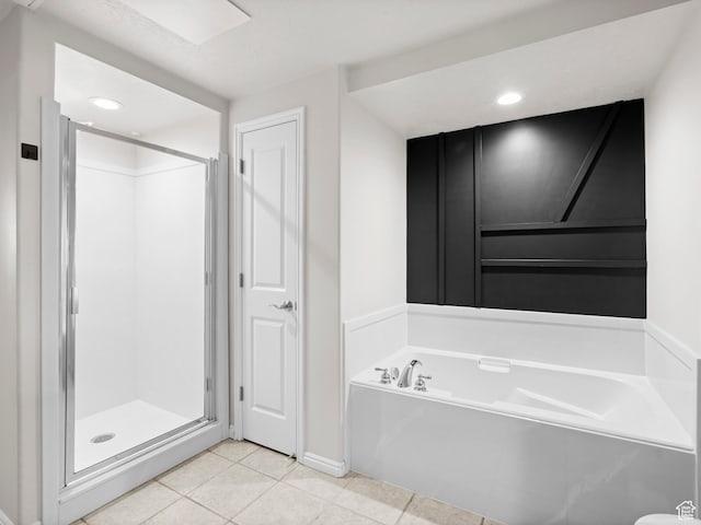 5 S 500 W Unit 311, Salt Lake City, UT 84101 - bathroom with recessed lighting, tile patterned flooring, a bath, baseboards, and a stall shower