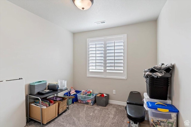 recreation room with baseboards, visible vents, and carpet
