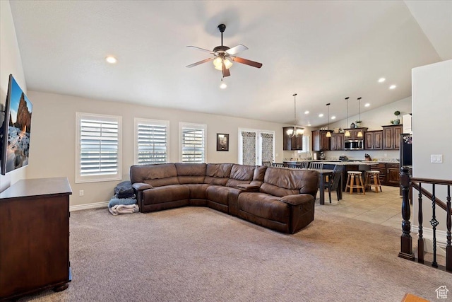 living room with vaulted ceiling, ceiling fan, light colored carpet, baseboards, and recessed lighting