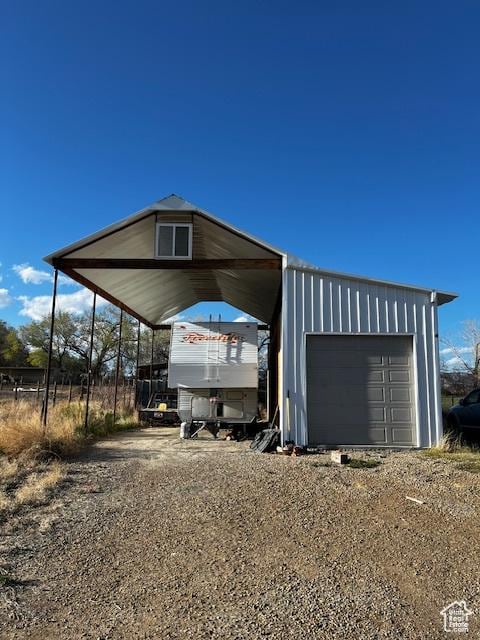 408 W 2000 S, Price, UT 84501 - view of parking / parking lot featuring driveway and a detached garage