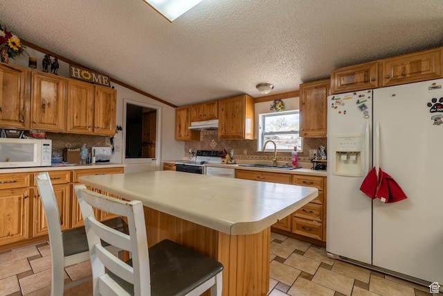 408 W 2000 S, Price, UT 84501 - kitchen with a sink, a textured ceiling, tasteful backsplash, white appliances, and light countertops