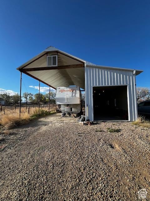 408 W 2000 S, Price, UT 84501 - exterior space featuring a detached garage, an outbuilding, and gravel driveway