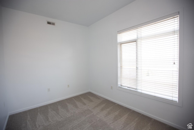 2150 S Main St Unit 514, Salt Lake City, UT 84115 - carpeted empty room featuring baseboards and visible vents