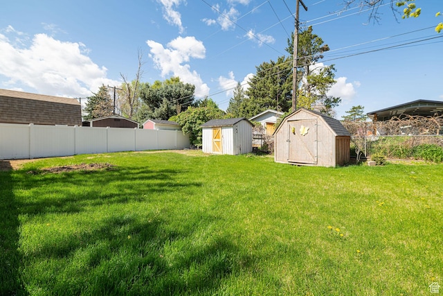 2005 N 500 E, North Ogden, UT 84414 - view of yard featuring an outdoor structure, a storage unit, and fence