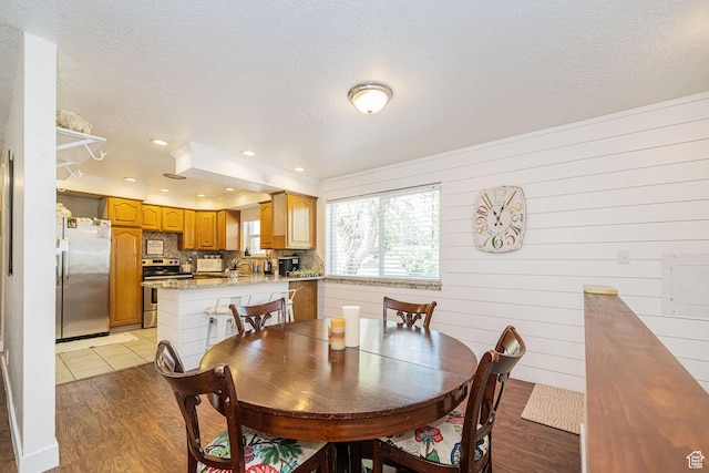 2005 N 500 E, North Ogden, UT 84414 - dining room with recessed lighting, a textured ceiling, and light wood finished floors