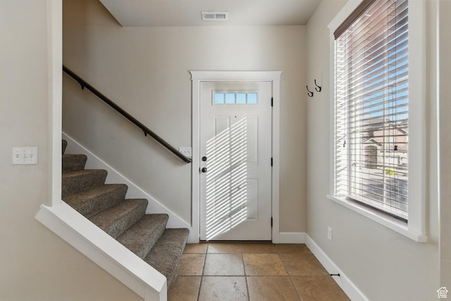 1247 N Baycrest Dr, Saratoga Springs, UT 84045 - entryway with visible vents, baseboards, and stairway