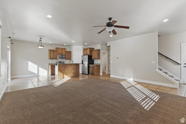 1247 N Baycrest Dr, Saratoga Springs, UT 84045 - unfurnished living room featuring light tile patterned flooring, baseboards, ceiling fan, and recessed lighting