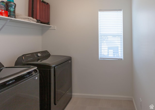 1719 N Pintail Dr Unit 60, Salem, UT 84653 - laundry room with washing machine and dryer, baseboards, light floors, and laundry area