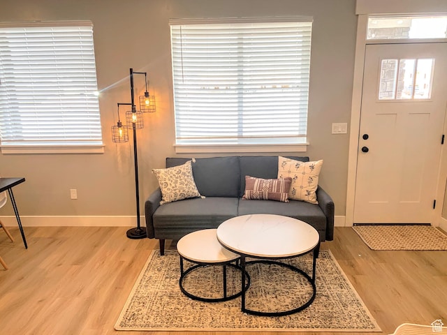 150 W Seasons Ln Unit 4, Garden City, UT 84028 - living room with baseboards and light wood-style flooring