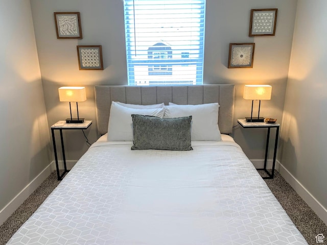 150 W Seasons Ln Unit 4, Garden City, UT 84028 - bedroom featuring baseboards and carpet flooring