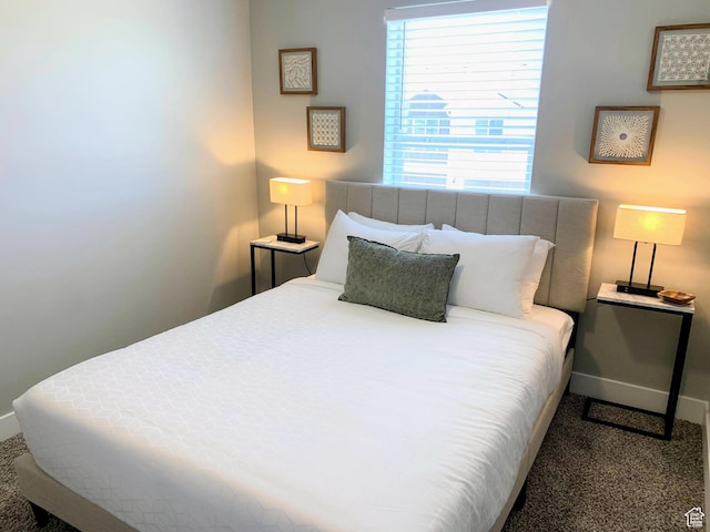 150 W Seasons Ln Unit 4, Garden City, UT 84028 - bedroom featuring baseboards and carpet