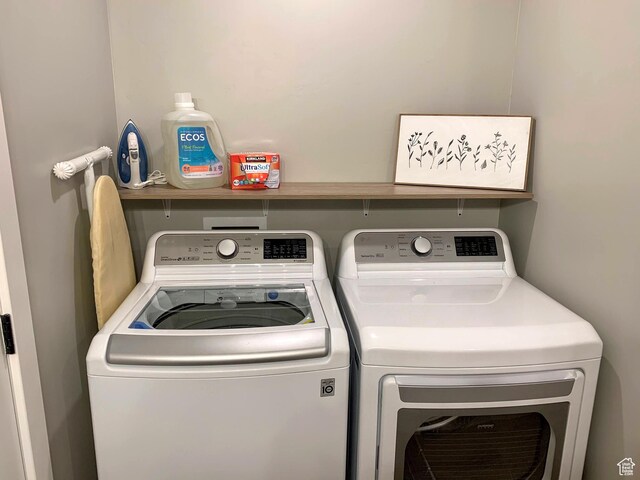 150 W Seasons Ln Unit 4, Garden City, UT 84028 - laundry room featuring washer and dryer and laundry area