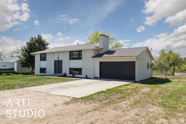4351 W 1400 N, Plain City, UT 84404 - bi-level home with a chimney, a front lawn, driveway, brick siding, and a garage