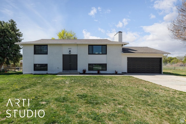 4351 W 1400 N, Plain City, UT 84404 - bi-level home with brick siding, driveway, a garage, and fence