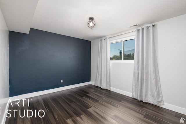 4351 W 1400 N, Plain City, UT 84404 - empty room featuring baseboards, visible vents, and dark wood-style floors