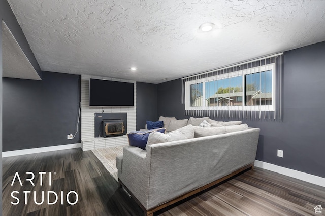 4351 W 1400 N, Plain City, UT 84404 - living area with a fireplace, wood finished floors, a textured ceiling, and baseboards