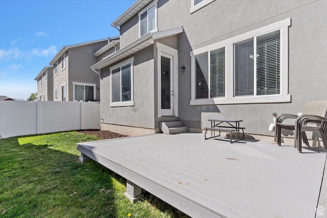 4941 W Chrome Rd, Herriman, UT 84096 - back of house with a lawn, a deck, fence, entry steps, and stucco siding
